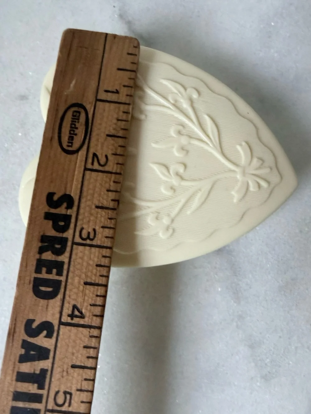 vintage Art Deco-style cream celluloid heart-shaped jewelry box